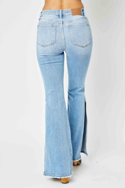 Judy Blue Full Size Mid Rise Raw Hem Slit Flare Jeans - Premium Jeans from Trendsi - Just $65! Shop now at noTORIous + co