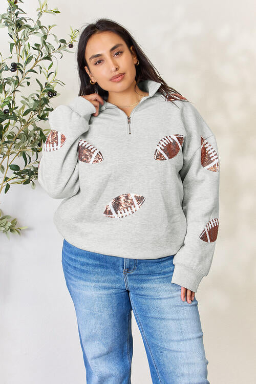 Double Take Full Size Sequin Football Half Zip Long Sleeve Sweatshirt - Premium Jacket from Trendsi - Just $42! Shop now at noTORIous + co