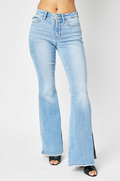 Judy Blue Full Size Mid Rise Raw Hem Slit Flare Jeans - Premium Jeans from Trendsi - Just $78.88! Shop now at noTORIous + co