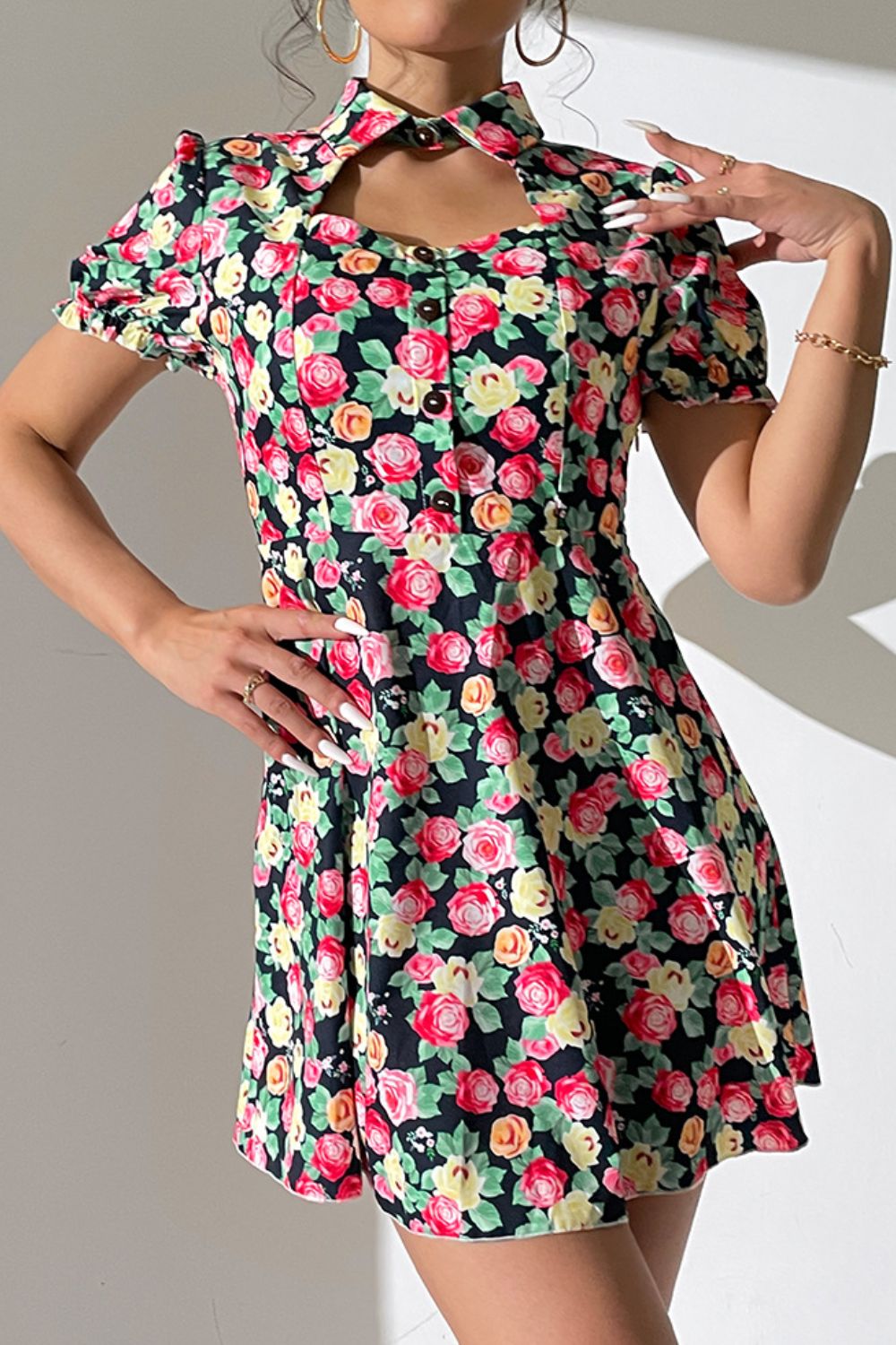 Floral Buttoned Cutout Puff Sleeve Dress - Premium Dresses from Trendsi - Just $28.00! Shop now at noTORIous + co